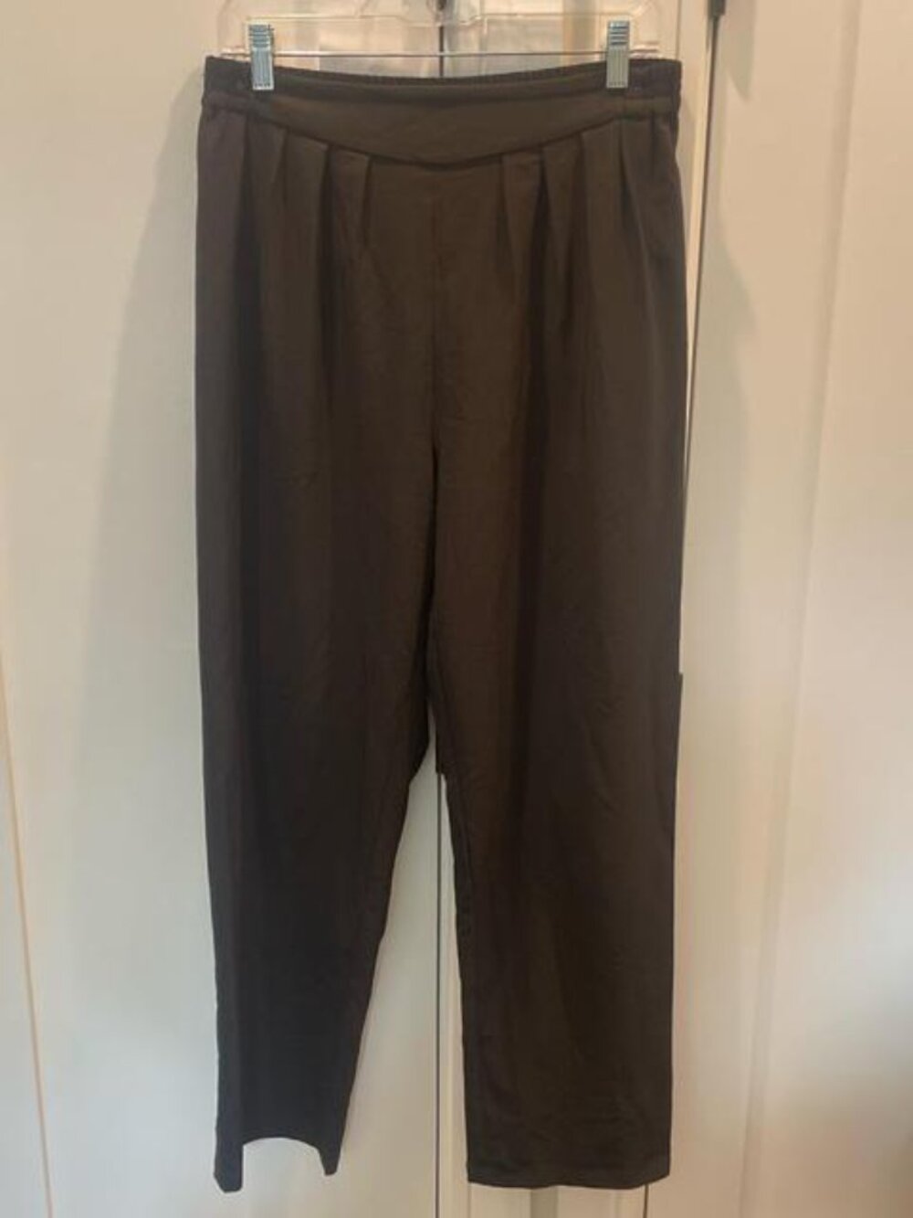 Brown high-waisted pleated trousers